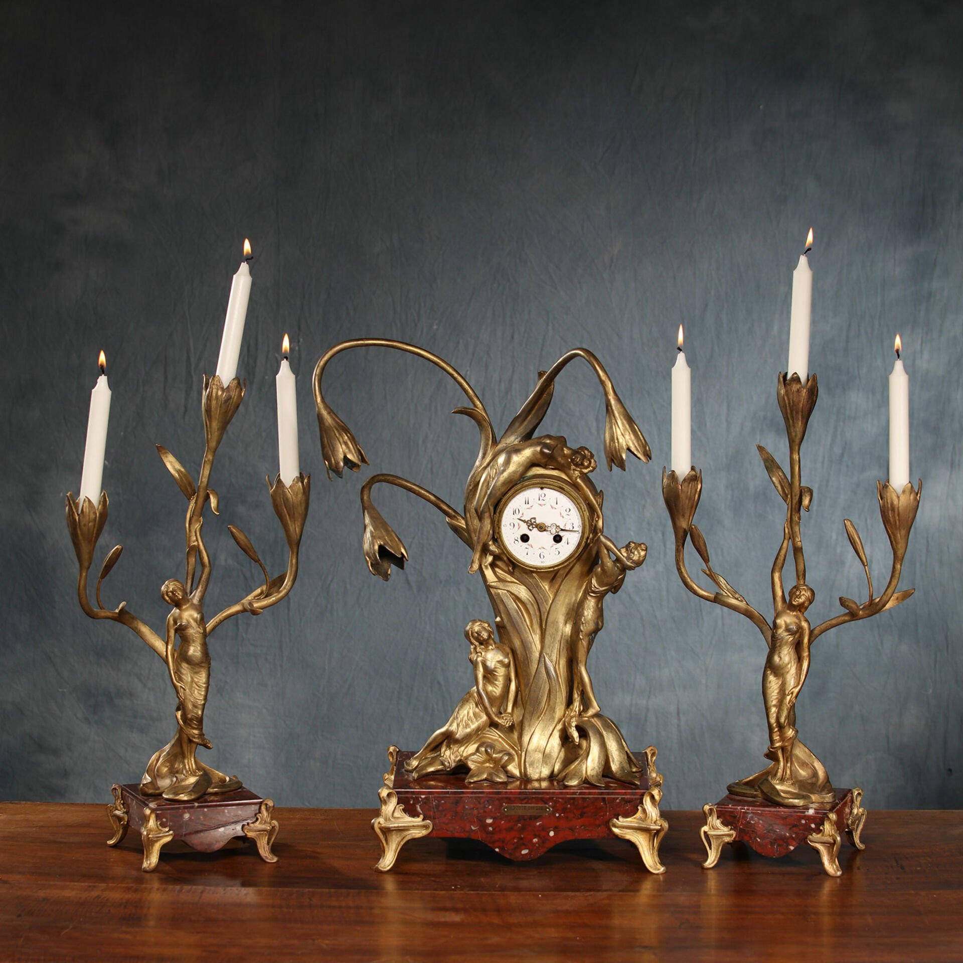 'Agonie de lis' Clock and Candlestick Set